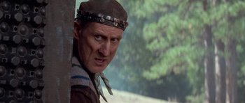 Movie still from “Star Trek: First Contact” (1996), directed by Jonathan Frakes – A person wearing a hat; Close Up shot, Over the shoulder angle