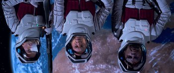 Movie still from “Star Trek: First Contact” (1996), directed by Jonathan Frakes – A man in a space suit is reflected in a mirror; Medium shot, Overhead angle