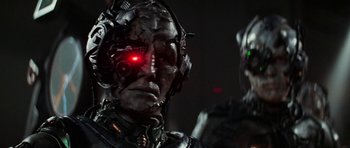 Movie still from “Star Trek: First Contact” (1996), directed by Jonathan Frakes – A person with a red eye; Close Up shot, Low angle