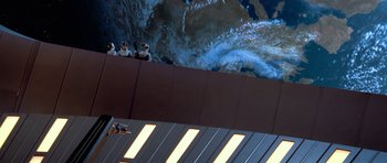 Movie still from “Star Trek: First Contact” (1996), directed by Jonathan Frakes – A group of people standing on top of a building; Extreme Wide shot, Overhead angle
