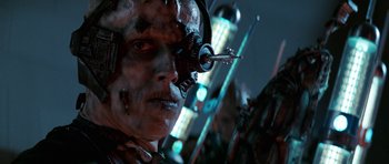 Movie still from “Star Trek: First Contact” (1996), directed by Jonathan Frakes – A person with a face mask; Close Up shot, Low angle