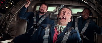 Movie still from “Star Trek: First Contact” (1996), directed by Jonathan Frakes – Two men in suits and ties in a vehicle; Medium shot, Overhead angle