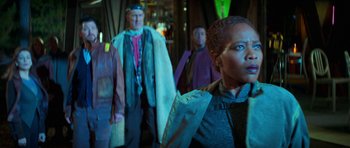 Movie still from “Star Trek: First Contact” (1996), directed by Jonathan Frakes – A group of people standing in a room; Medium shot, Over the shoulder angle