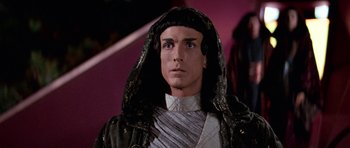 Movie still from “Star Trek: First Contact” (1996), directed by Jonathan Frakes – A person wearing a robe and a hood; Close Up shot, Over the shoulder angle