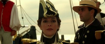 Movie still from “Star Trek: Generations” (1994), directed by David Carson – A person wearing a hat on a boat; Close Up shot, Low angle