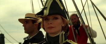 Movie still from “Star Trek: Generations” (1994), directed by David Carson – A person wearing a hat on a boat; Close Up shot, Low angle