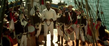 Movie still from “Star Trek: Generations” (1994), directed by David Carson – A group of men in period dress standing next to each other on a boat; Medium shot, High angle