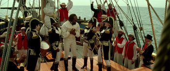 Movie still from “Star Trek: Generations” (1994), directed by David Carson – A group of people in uniforms on a boat; Wide shot, High angle