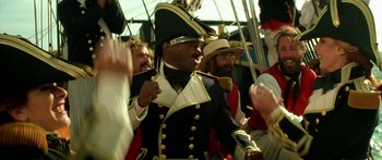 Movie still from “Star Trek: Generations” (1994), directed by David Carson – A man in a military uniform; Medium shot, Low angle