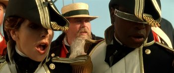 Movie still from “Star Trek: Generations” (1994), directed by David Carson – A man with a beard and a hat is looking at another man with a hat; Close Up shot, Low angle