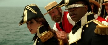 Movie still from “Star Trek: Generations” (1994), directed by David Carson – A group of men and women standing next to each other; Close Up shot, Over the shoulder angle