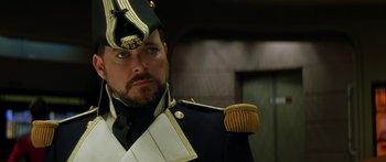 Movie still from “Star Trek: Generations” (1994), directed by David Carson – A person wearing a uniform; Close Up shot, Low angle