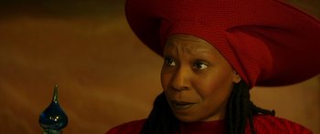 Movie still from “Star Trek: Generations” (1994), directed by David Carson – An older woman wearing a red hat and a black scarf; Close Up shot, Over the shoulder angle