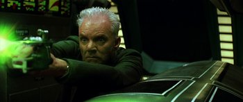Movie still from “Star Trek: Generations” (1994), directed by David Carson – An older man with white hair sitting in a car; Close Up shot, High angle