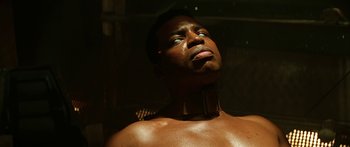 Movie still from “Star Trek: Generations” (1994), directed by David Carson – A man with his eyes closed and his head tilted to the side; Close Up shot, Low angle