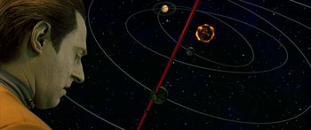 Movie still from “Star Trek: Generations” (1994), directed by David Carson – An image of a solar system in the night sky; Extreme Wide shot, High angle