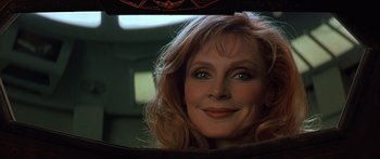 Movie still from “Star Trek: Generations” (1994), directed by David Carson – A woman's face in a car mirror; Close Up shot, Low angle