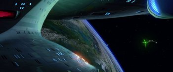 Movie still from “Star Trek: Generations” (1994), directed by David Carson – A view of earth taken from a space station; Extreme Wide shot, Overhead angle