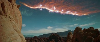 Movie still from “Star Trek: Generations” (1994), directed by David Carson – A sky filled with strange clouds and a mountain range; Extreme Wide shot, Low angle