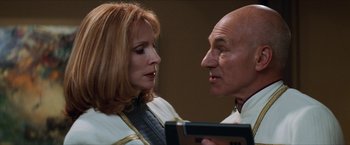 Movie still from “Star Trek: Insurrection” (1998), directed by Jonathan Frakes – A man and a woman looking at each other; Close Up shot, Over the shoulder angle