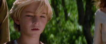 Movie still from “Star Trek: Insurrection” (1998), directed by Jonathan Frakes – A person with blond hair; Close Up shot, Over the shoulder angle