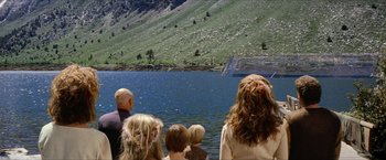 Movie still from “Star Trek: Insurrection” (1998), directed by Jonathan Frakes – A group of people on a boat in the water; Extreme Wide shot, Over the shoulder angle