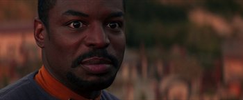 Movie still from “Star Trek: Insurrection” (1998), directed by Jonathan Frakes – A man's eyes and face; Close Up shot, Over the shoulder angle