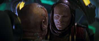 Movie still from “Star Trek: Insurrection” (1998), directed by Jonathan Frakes – A person with an alien face; Close Up shot, Over the shoulder angle