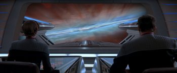 Movie still from “Star Trek: Insurrection” (1998), directed by Jonathan Frakes – A view of a sky from an escalator; Extreme Wide shot, Overhead angle