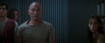 Movie still from “Star Trek: Insurrection” (1998), directed by Jonathan Frakes – Patrick stewart as jean - luc picard in star trek : the next generation; Close Up shot, Low angle