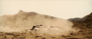 Movie still from “Star Trek: Nemesis” (2002), directed by Stuart Baird – An image of an airplane in the desert; Extreme Wide shot, Low angle