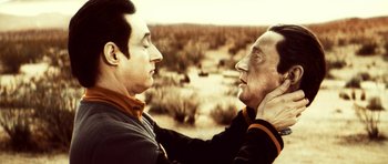 Movie still from “Star Trek: Nemesis” (2002), directed by Stuart Baird – A man and an older man face to face; Close Up shot, Over the shoulder angle