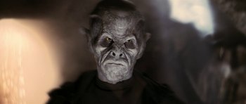 Movie still from “Star Trek: Nemesis” (2002), directed by Stuart Baird – A person wearing a costume; Close Up shot, Low angle