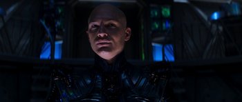 Movie still from “Star Trek: Nemesis” (2002), directed by Stuart Baird – A bald man in a black leather jacket looking at the camera; Close Up shot, Low angle