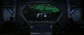 Movie still from “Star Trek: Nemesis” (2002), directed by Stuart Baird – A space ship in a room with a view of the sky; Extreme Wide shot, Overhead angle