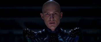 Movie still from “Star Trek: Nemesis” (2002), directed by Stuart Baird – A bald man in a black leather jacket; Close Up shot, Low angle