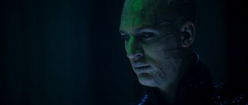 Movie still from “Star Trek: Nemesis” (2002), directed by Stuart Baird – A person with a face paint on; Close Up shot, Over the shoulder angle