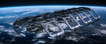 Movie still from “Star Trek: Nemesis” (2002), directed by Stuart Baird – An aerial view of a space station in space; Extreme Wide shot, High angle