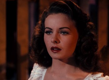 Movie still from “State Fair” (1945), directed by Walter Lang – A person wearing a dress; Close Up shot, Over the shoulder angle