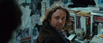 Movie still from “State of Play” (2009), directed by Kevin Macdonald – A person with long hair; Close Up shot, Over the shoulder angle
