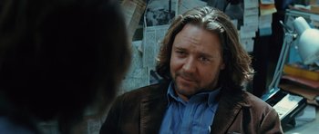 Movie still from “State of Play” (2009), directed by Kevin Macdonald – A person with long hair; Close Up shot, Over the shoulder angle