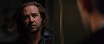 Movie still from “State of Play” (2009), directed by Kevin Macdonald – A person with long hair; Close Up shot, Over the shoulder angle