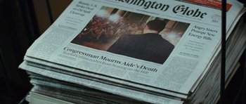 Movie still from “State of Play” (2009), directed by Kevin Macdonald – A stack of newspapers with the front page of the washington post; Extreme Close Up shot, High angle