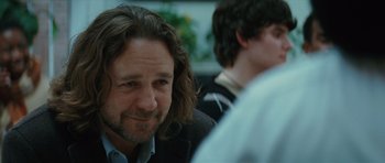 Movie still from “State of Play” (2009), directed by Kevin Macdonald – A person with long hair; Close Up shot, Over the shoulder angle