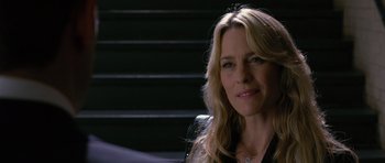 Movie still from “State of Play” (2009), directed by Kevin Macdonald – A person wearing a black jacket; Close Up shot, Over the shoulder angle