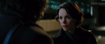 Movie still from “State of Play” (2009), directed by Kevin Macdonald – A woman looking at the camera while talking to another woman; Close Up shot, Over the shoulder angle