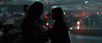 Movie still from “State of Play” (2009), directed by Kevin Macdonald – Two people standing next to each other in the dark; Close Up shot, Over the shoulder angle