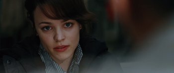 Movie still from “State of Play” (2009), directed by Kevin Macdonald – A woman's face in a black jacket; Close Up shot, Over the shoulder angle