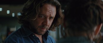Movie still from “State of Play” (2009), directed by Kevin Macdonald – A person with long hair; Close Up shot, Over the shoulder angle