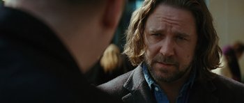 Movie still from “State of Play” (2009), directed by Kevin Macdonald – A person with long hair; Close Up shot, Over the shoulder angle
